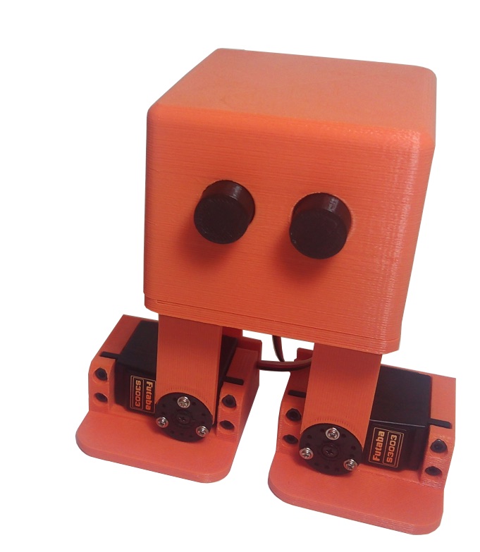 Photograph of the original four-servo, printable BQ Zowi. Cropped to remove an unrelated beverage can.